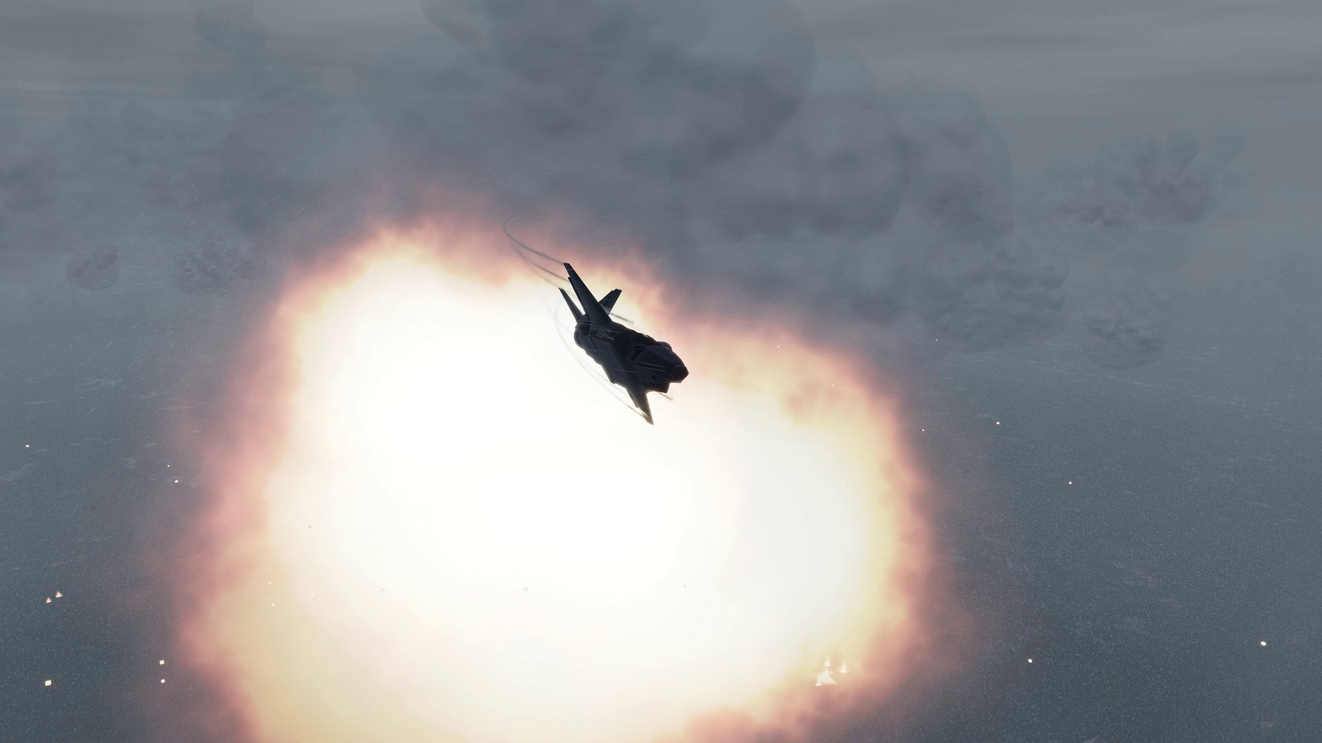 A tactical release blooms behind the egressing jet.